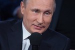 Tổng thống Putin trổ tài làm thông dịch viên tiếng Đức