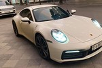 Vợ chồng Cường Đô la chạy Porsche 911 gần 8 tỷ đồng ra Bắc