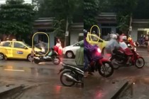 Video: Bị taxi văng nước trúng người, 3 thanh niên lấy gạch đập đầu tài xế