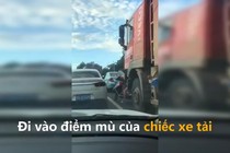 Video: Người phụ nữ thoát chết đến khó tin khi bị xe tải cuốn vào gầm