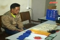 9X vận chuyển 2 bánh heroin và 30.000 viên ma túy