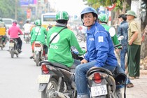 Hà Nội cấm dịch vụ đi chung xe của Uber, Grab