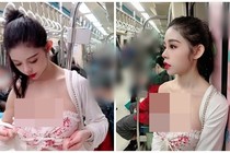 Hot girl siêu vòng 1 thản nhiên chỉnh áo ngực trên tàu điện