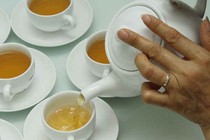 Không uống trà xanh sau khi ăn thịt chó