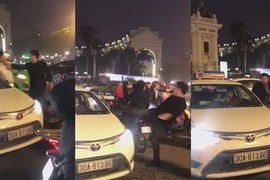 Video: Va chạm nhẹ, tài xế Mercedes liên tục đấm đá rồi đạp bay gương taxi