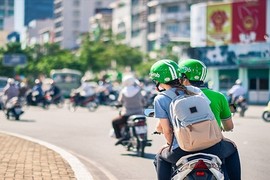 Khe cửa hẹp cho Grab VN “thoát hiểm” trong thương vụ thâu tóm Uber