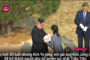 Người phụ nữ bí ẩn bên cạnh ông Kim Jong-un là ai? 