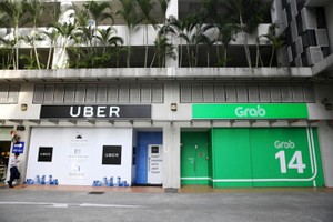 Sáp nhập Uber với Grab có dấu hiệu vi phạm Luật Cạnh tranh?