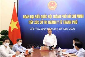 Chủ tịch nước: TPHCM đã qua đỉnh dịch nhưng không được chủ quan