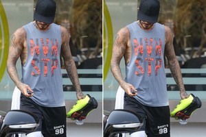 Chi chít hình xăm về đàn bà trên cơ thể David Beckham