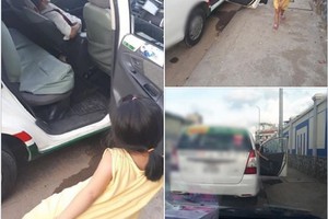 Con gái nhỏ trông cho ba lái taxi ngủ gây xúc động cộng đồng mạng