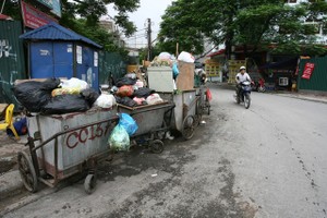 Ảnh: Những bãi rác lộ thiên bẩn thỉu giữa lòng Hà Nội 