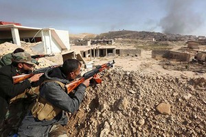 Chùm ảnh dân quân người Kurd tấn công IS ở Sinjar