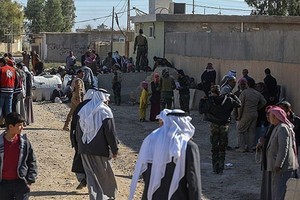 Ảnh Dân thường Iraq ùn ùn trở về nhà gần Mosul