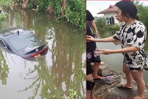 Xế hộp lao thẳng xuống ao, CĐM xôn xao “bán xăng cho phụ nữ là tội ác“