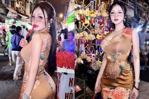 Lên "phố Tây" Bùi Viện, hot girl áo dài khoe vòng 1 đẫy đà