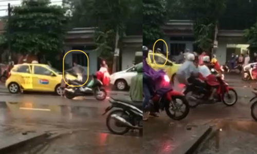 Video: Bị taxi văng nước trúng người, 3 thanh niên lấy gạch đập đầu tài xế