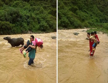 Thầy giáo cõng học sinh vượt lũ đến trường