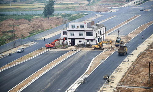 Những ngôi nhà “chây ì” ở Trung Quốc qua ảnh