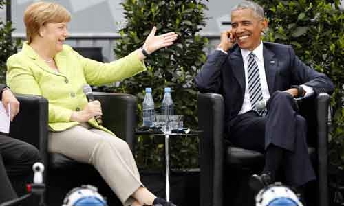 Ảnh: Cựu Tổng thống Obama gặp lại bà Merkel ở Berlin 