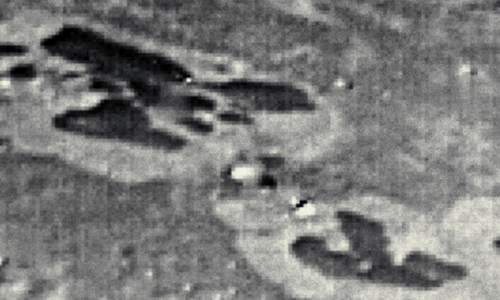 Bí ẩn nhiều dấu vết lạ trên mặt trăng sao Hải Vương