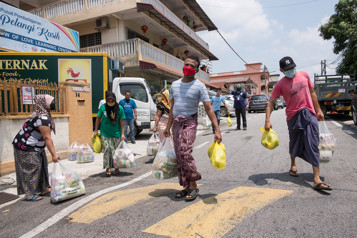 Hình ảnh người tị nạn ở Malaysia vật lộn cuộc sống giữa mùa dịch COVID-19