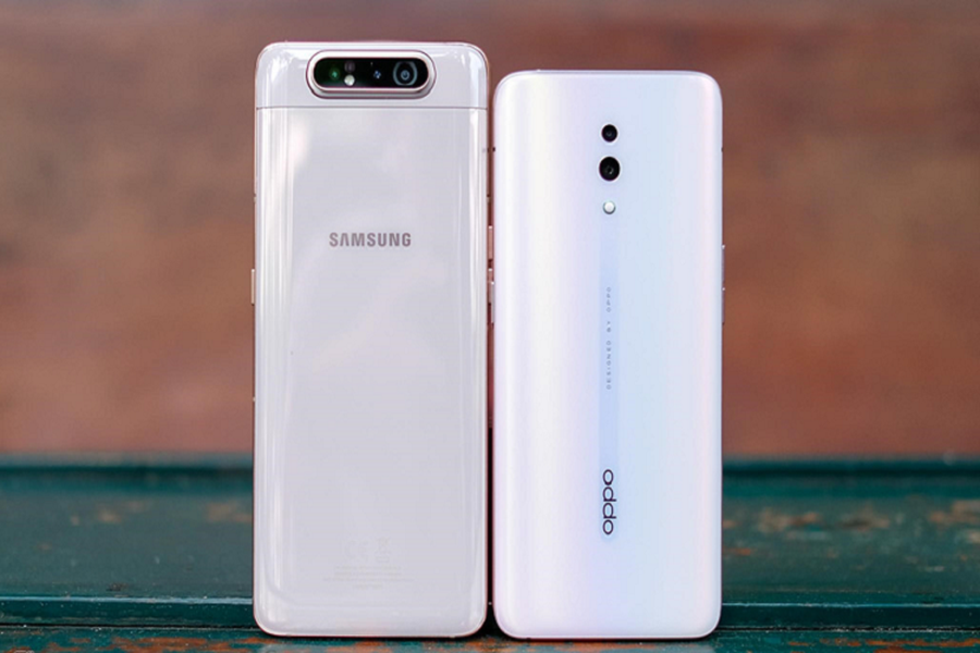  Điện thoại Oppo Reno lên kệ vào tháng 6 với giá 13 triệu đồng, Galaxy A80 ra mắt vào đầu tháng 7 với mức giá 15 triệu đồng. Hai model này cạnh tranh trực tiếp với nhau trong phân khúc cận cao cấp tại Việt Nam.