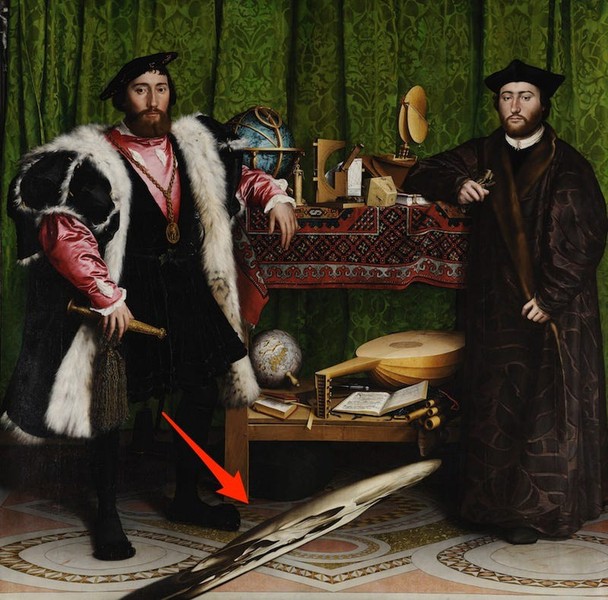 The Ambassadors là  bức tranh nổi tiếng của danh họa người Đức Hans Holbein. Toàn bộ bức tranh này mới nhìn trông có vẻ rất bình thường cho đến khi bạn chú ý tới một "vật thể lạ" ở giữa 2 người đàn ông trong hình. Nếu nhìn từ bên phải, vật thể này dường như là một đầu lâu bị biến dạng. Một số người cho rằng chiếc đầu lâu này là biểu tượng cho cụm từ tiếng Latin "memento mori", nghĩa là "hãy nhớ rằng rồi bạn sẽ chết". "Memento mori" được cho là một châm ngôn của người đàn ông bên trái bức tranh - Đại sứ Pháp Jean de Dinteville.