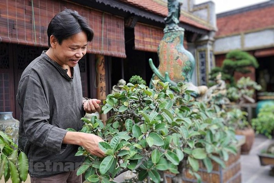 Ngôi  nhà cổ 5 gian truyền thống Bắc Bộ trên sân thượng của ngôi nhà lớn bên Bát Tràng thuộc sở hữu của nghệ nhân ưu tú Trần Nam Tước. Ảnh: Xuân Mai/Vietnam+