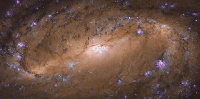 Canh chua tung co ve thien ha xoan oc NGC 2903 gay soc