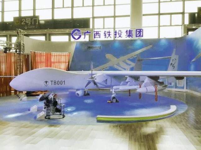 Theo đó Trung Quốc vừa cho ra mắt mẫu  máy bay tấn công không người lái (UAV) thế hệ tiếp theo của nước này có tên mã TB001 tại triển lãm Expo tại Nam Ninh, Quảng Tây, Trung Quốc. Bên cạnh đó Trung Quốc còn giới thiệu một loạt vũ khí tấn công dành cho TB001, trong đó có cả tên lửa chống tăng. Nguồn ảnh: Janes.