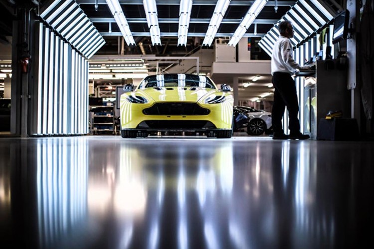 "Q by Aston Martin" chuyên làm nhiệm vụ cá nhân hoá những chiếc  siêu xe của Aston Martin theo yêu cầu của khách hàng, tạo ra những phiên bản có một không hai. Trụ sở chính của Aston Martin hiện đang được đặt tại ngôi làng Gaydon, Anh - đây cũng là nơi ra đời nhiều thế hệ siêu xe đình đám trên Thế giới của hãng xe lâu đời này.