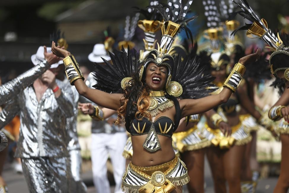 Người phụ nữ tham gia diễu hành tại  lễ hội đường phố lớn nhất Châu Âu Notting Hill Carnival ở London (Anh) ngày 29/8/2016.