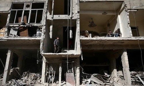 Những tòa nhà bị phá hủy trong các cuộc giao tranh tại thị trấn Douma, Ghouta, ngoại ô  thủ đô Damascus, hôm 22/11/2016.