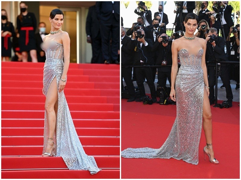 Isabeli Fontana lọt top mỹ nhân mặc đẹp nhất thảm đỏ  Cannes 2021 ngày thứ 8. Chân dài 38 tuổi chọn mẫu váy cúp ngực xẻ đùi.