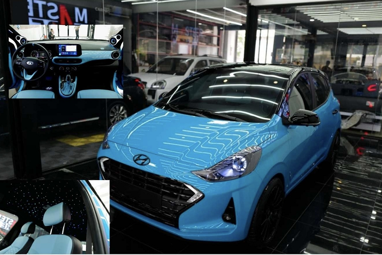 Để loại bỏ sự nhàm chán trên chiếc  Hyundai Grand i10 giá rẻ, chủ xe đã yêu cầu sơn lại xe trong màu xanh dương Miami Blue (mã màu của Porsche) kết hợp với mui xe sơn đen để tăng vẻ thể thao.