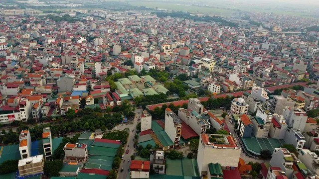 Làng Ninh Hiệp (xã Ninh Hiệp, Gia Lâm, Hà Nội) xưa là làng Nhành, tổng Nành thuộc xứ Đông Ngàn, Kinh Bắc. Nơi đây nổi tiếng với chợ vải Ninh Hiệp được mệnh danh là "con đường tơ lụa" của Việt Nam. Ảnh: Pháp luật &amp; bạn đọc