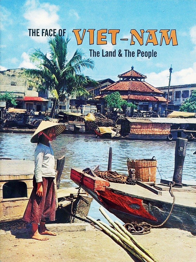 Bìa ấn phẩm The Face of VIETNAM - The Land &amp; The People (Gương mặt Việt Nam - Đất nước &amp; Con người ) với hình Rạch Thị Nghè và chợ Thị Nghè,  Sài Gòn thập niên 1960.