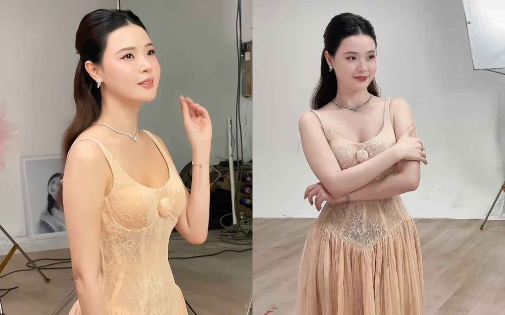 Trong bức ảnh mới đăng tải, Midu diện mẫu váy táo bạo mang tông màu cam nude, tôn lên làn da mịn màng. Thiết kế này là sự kết hợp của mẫu áo corset cùng tùng váy xoè mềm mại, bồng bềnh.