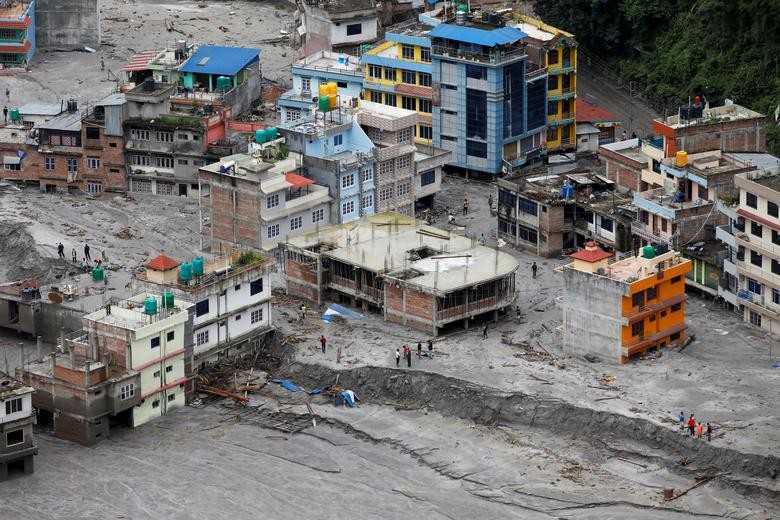 Theo Reuters, mưa lớn kéo dài đã gây ra tình trạng  lũ quét và sạt lở đất ở Nepal trong tuần qua, làm ảnh hưởng nghiêm trọng đến cuộc sống của nhiều người dân nước này. (Nguồn ảnh: Reuters)