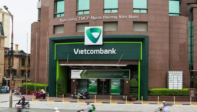  Ngân hàng Vietcombank vừa công bố lợi nhuận trước thuế đạt 11.018 tỷ, tăng 32,9% so với năm 2016, thực hiện 116% kế hoạch 2017. Ảnh: laisuatnganhang.vn.