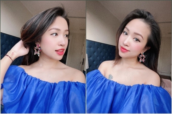 Ở tuổi U40, MC Thanh Vân (Vân Hugo) ngày càng đẹp mặn mà, quyến rũ. Là một trong những hotgirl đời đầu của showbiz Việt, Vân Hugo ghi điểm với diện mạo xinh đẹp, trẻ trung. Cô chuộng các trang phục trễ vai có màu sắc bắt mắt, điển hình là thiết kế màu xanh coban được cô mix&amp;match cùng bông tai ngôi sao đính đá.