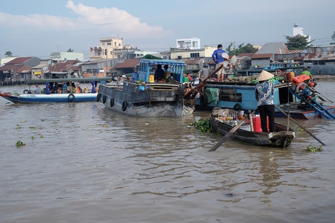  Thăm chợ nổi Cái Răng (Cần Thơ): Đây là một trong những nét văn hóa đặc trưng của  sông nước miền Tây thu hút nhiều khách tham quan trong và ngoài nước. Ảnh: Minh Hằng.