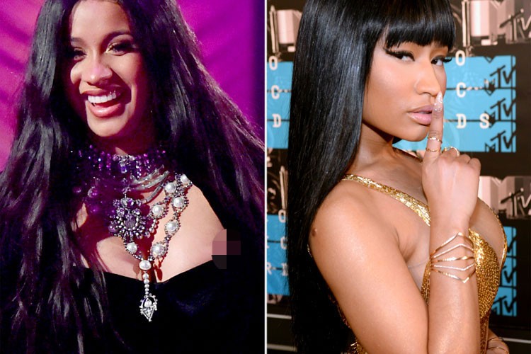 Một nguồn tin tiết lộ với People, Nicki Minaj (phải) đã cố tình giẫm lên váy của Cardi B tại một sự kiện mới đây. Ảnh: Usmagazine