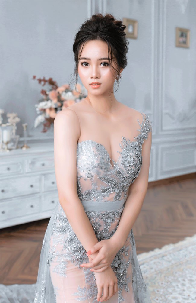 Nguyễn Thị Minh Trang, cao 1m70, cân nặng 54kg, số đo ba vòng 87-65-94.