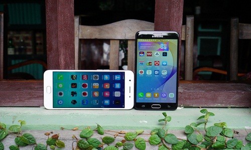 OPPO F1s và  Samsung Galaxy J7 Prime là hai mẫu điện thoại tầm trung đình đám nhất thị trường Việt thời gian gần đây. Ảnh: Techz.