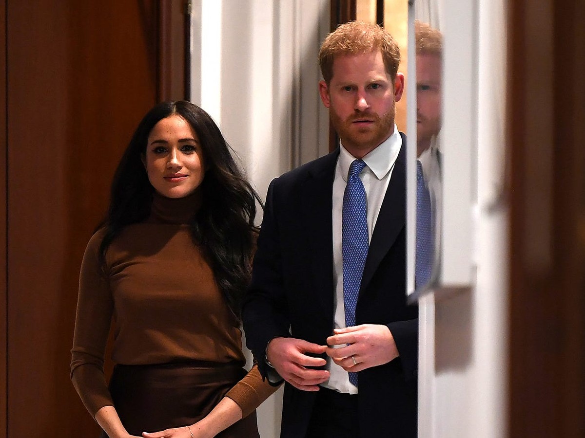 Ngày 18/1, Điện Buckingham và Nữ hoàng Anh Elizabeth II tuyên bố Hoàng tử Harry và vợ, Meghan Markle, sẽ không còn là những thành viên có vai trò chính thức của Hoàng gia Anh. Ảnh: Getty.