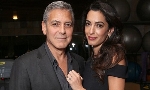 Vợ George Clooney hạn chế đi lại để giữ thai đôi