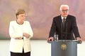 Thủ tướng Đức Merkel lại run lẩy bẩy giữa sự kiện công khai