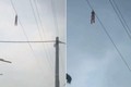 Kinh hoàng cảnh bé gái treo trên dây điện cao 15m bởi lý do không ngờ